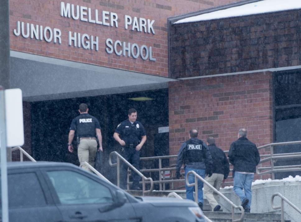 Rick Egan | The Salt Lake Tribune

Police officers enter Mueller Park Jr High around 8:30 A.M. on Thursday, December 1, 2016.