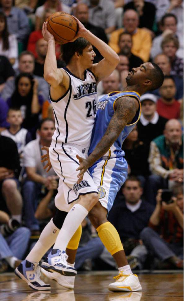 Chris Detrick | The Salt Lake Tribune

Utah Jazz's Kyle Korver (26) is guarded by Denver Nuggets' J.R. Smith (5) as the Jazz face the Nuggets in the fourth game of the first round playoff series at EnergySolutions Arena Sunday, April 25, 2010.