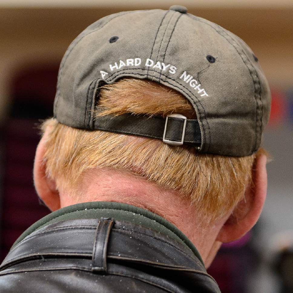 Trent Nelson  |  The Salt Lake Tribune
"A Hard Days Night" on a baseball cap at the Rowland Hall & Crossroads Urban Center Holiday Meal Giveaway for Utah Families in Need in Salt Lake City, Friday December 23, 2016.