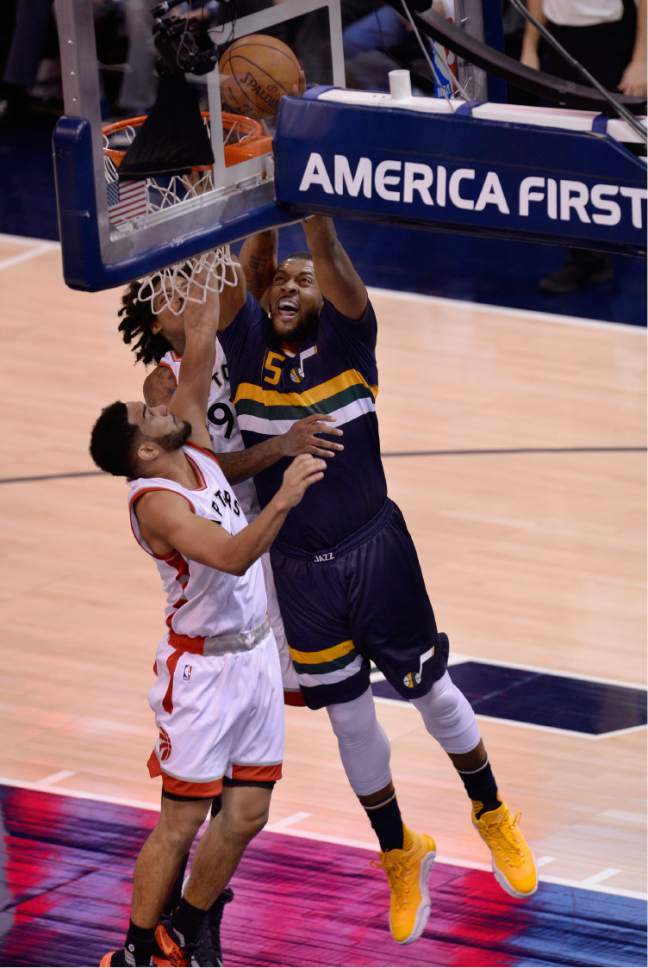 Scott Sommerdorf   |  The Salt Lake Tribune  
Utah Jazz forward Derrick Favors (15) drives to the hoop during first half play as the Toronto Raptors led the Jazz 56-51 at the half, Friday, December 23, 2016.