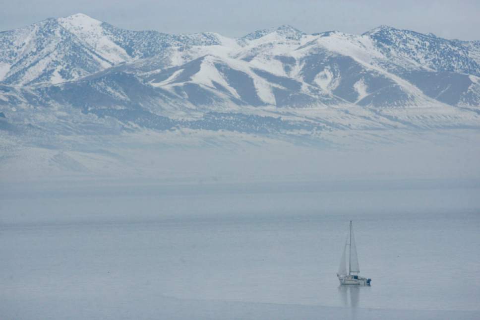 Tribune file photo
A sailor takes his craft near the north tip of Antelope Island, from this vantage point looking northeast.