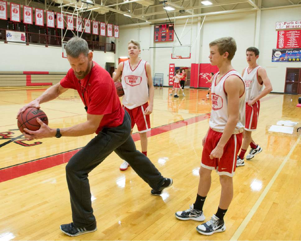 Rick Egan  |  The Salt Lake Tribune

Mike Doleac, former Ute basketball star and NBA veteran, works with his players, as the head coach at Park City High School, during practice, Monday, December 19, 2016.
