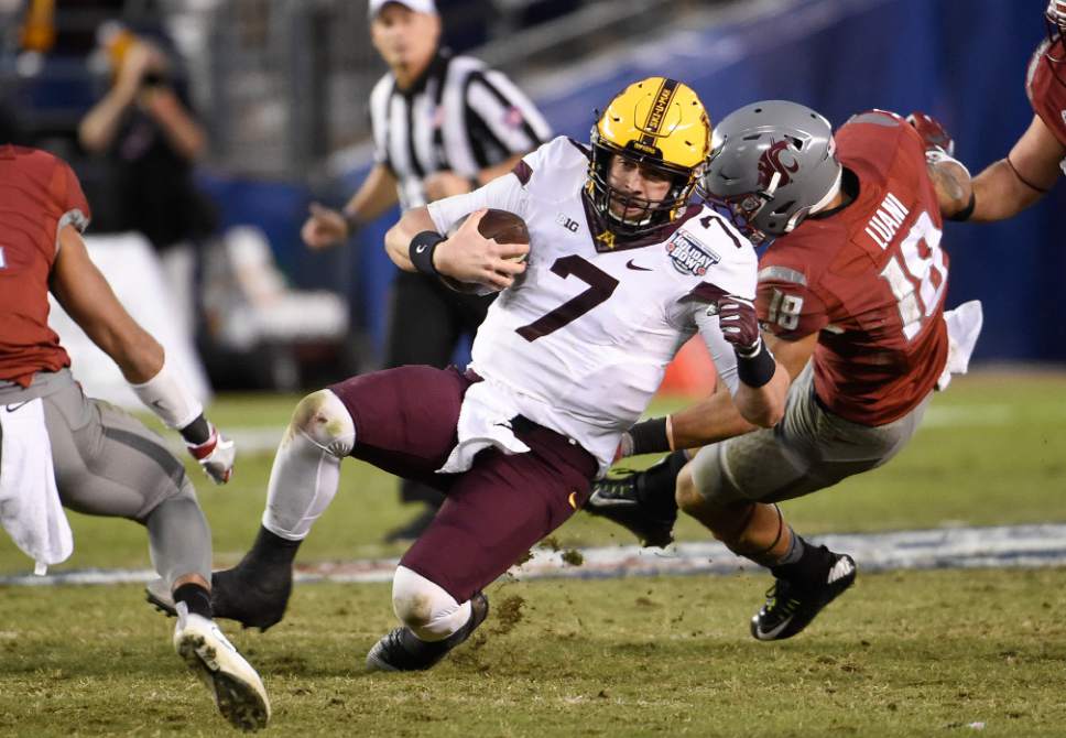 College football: Minnesota emerges from turmoil to upset ...