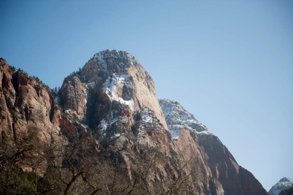 Jeremy Harmon  |  The Salt Lake Tribune

Snow sits high on the cliffs of a rock formation at Zion National Park on Saturday, March 7, 2015