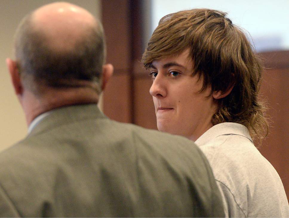 Al Hartmann  |  The Salt Lake Tribune                 
Clay Brewer, 17, of Snowflake, Arizona meets with his defense attorney Ron Yengich in Judge Wallace Lee's 6th District Court in Panguitch Thursday Dec. 29 to make his first court appearance.  He is being charge as an adult with first-degree-felony counts of aggravated murder, attempted aggravated murder and aggravated robbery, as well as a third-degree-felony count of failure to stop at the command of police, and misdemeanor counts of tampering with evidence, reckless endangerment, theft and reckless driving. He is accused of killing 61-year-old Jimmy Woolsey during an attack at Turn-About Ranch School, located north of Escalante.
