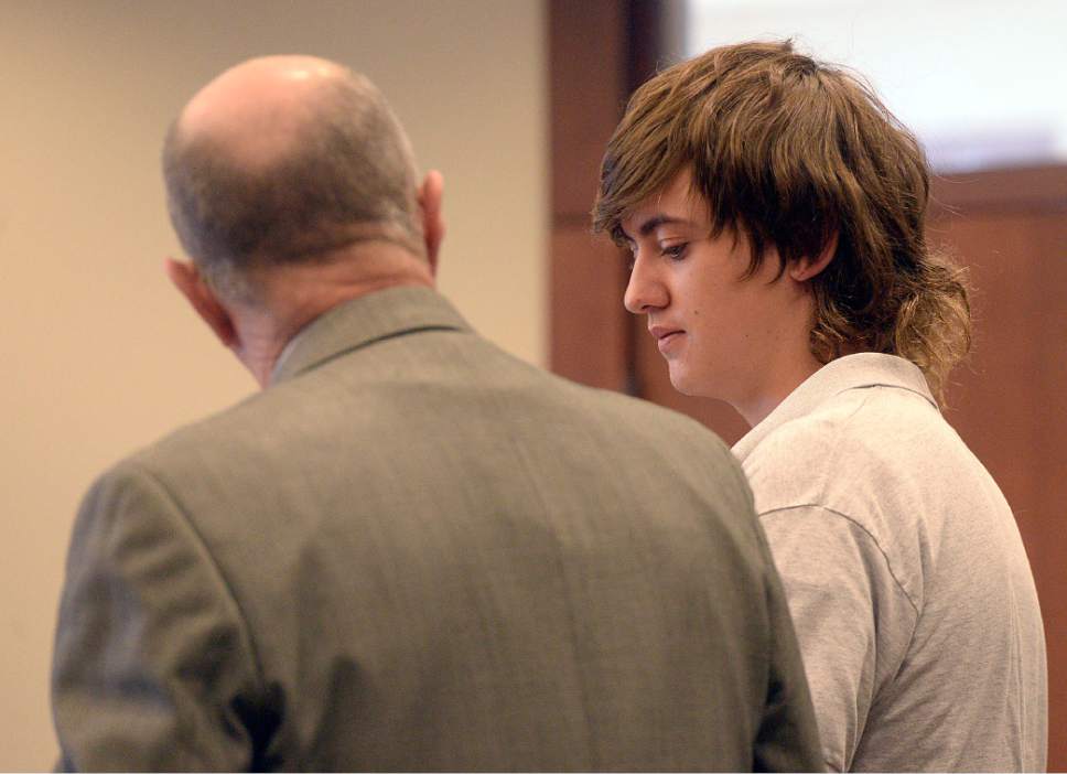 Al Hartmann  |  The Salt Lake Tribune                 
Clay Brewer, 17, of Snowflake, Arizona meets with his defense attorney Ron Yengich in Judge Wallace Lee's 6th District Court in Panguitch Thursday Dec. 29 to make his first court appearance.  He is being charge as an adult with first-degree-felony counts of aggravated murder, attempted aggravated murder and aggravated robbery, as well as a third-degree-felony count of failure to stop at the command of police, and misdemeanor counts of tampering with evidence, reckless endangerment, theft and reckless driving. He is accused of killing 61-year-old Jimmy Woolsey during an attack at Turn-About Ranch School, located north of Escalante.