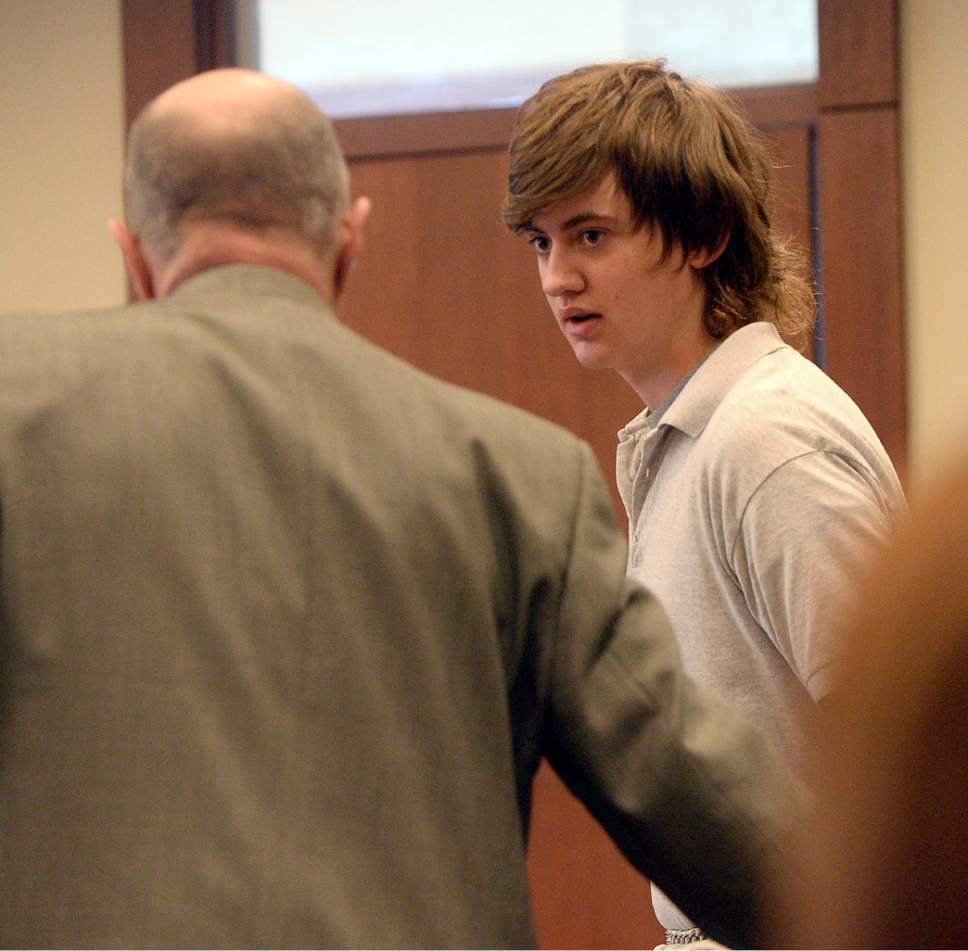 Al Hartmann  |  The Salt Lake Tribune                 
Clay Brewer, 17, of Snowflake, Arizona  meets with his defense attorney Ron Yengich in Judge Wallace Lee's 6th District Court in Panguitch Thursday Dec. 29 to make his first court appearance.  He is being charge as an adult with first-degree-felony counts of aggravated murder, attempted aggravated murder and aggravated robbery, as well as a third-degree-felony count of failure to stop at the command of police, and misdemeanor counts of tampering with evidence, reckless endangerment, theft and reckless driving. He is accused of killing 61-year-old Jimmy Woolsey during an attack at Turn-About Ranch School, located north of Escalante.