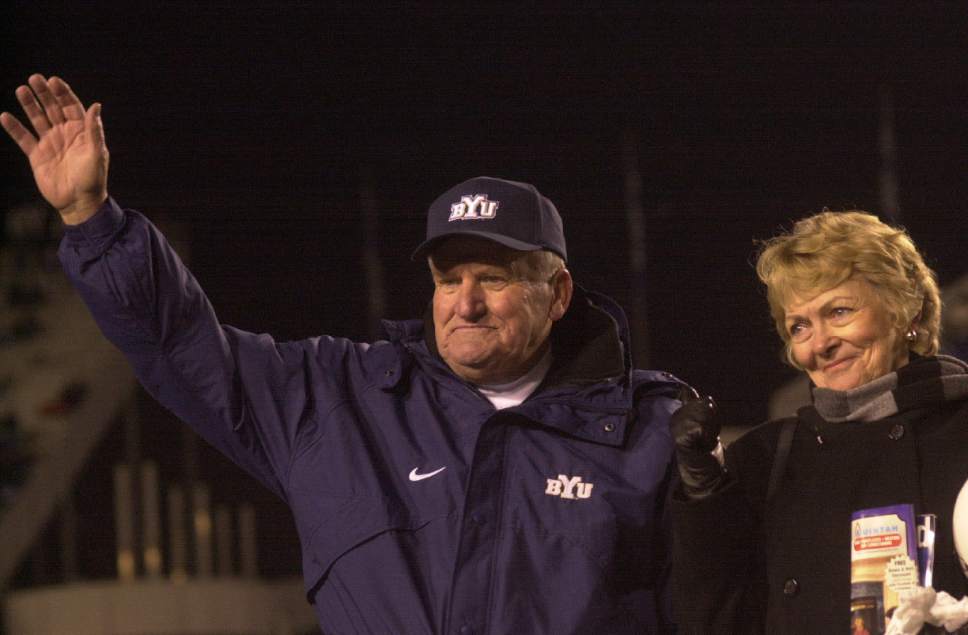 Rick Egan  |  The Salt Lake Tribune

With his wife Patti by his side, coach LaVell Edwards waves to the crowd before leaving the BYU home field for the last time after beating New Mexico on November 18, 2000.