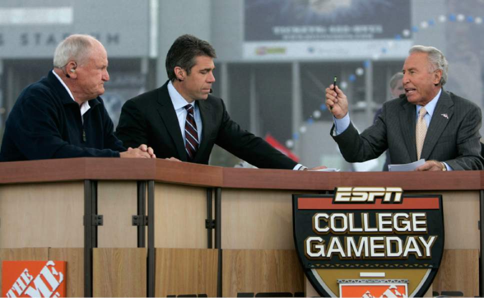 |  Tribune File Photo

Former BYU football coach LaVell Edwards, left, and ESPN's Chris Fowler, center, and ESPN's Lee Corso talk during a broadcast of ESPN's College GameDay pregame show Saturday, October 24 2009 next to LaVell Edwards Stadium at Brigham Young University in Provo. Hundreds of college football fans turned out for the airing of ESPN's College GameDay pregame show prior to the BYU-TCU matchup where host Lee Corso picked the winner to be TCU.