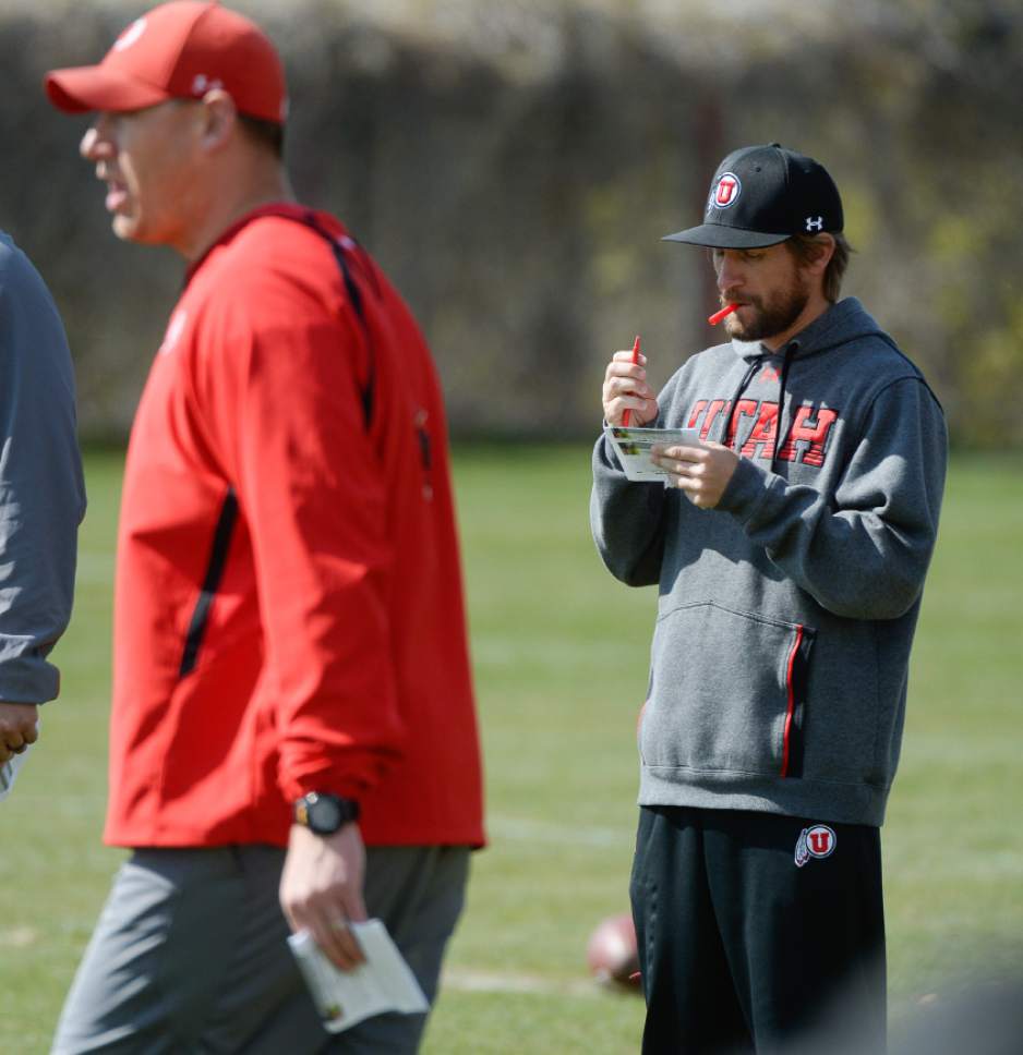 Francisco Kjolseth  |  The Salt Lake Tribune 
Jim Harding, left, is the tallest coach on the field and his bark is a constant presence at Utah football practice, while Aaron Roderick, right, is the quiet, note-taking coach who almost never speaks during sessions outside of one-on-one conversations.