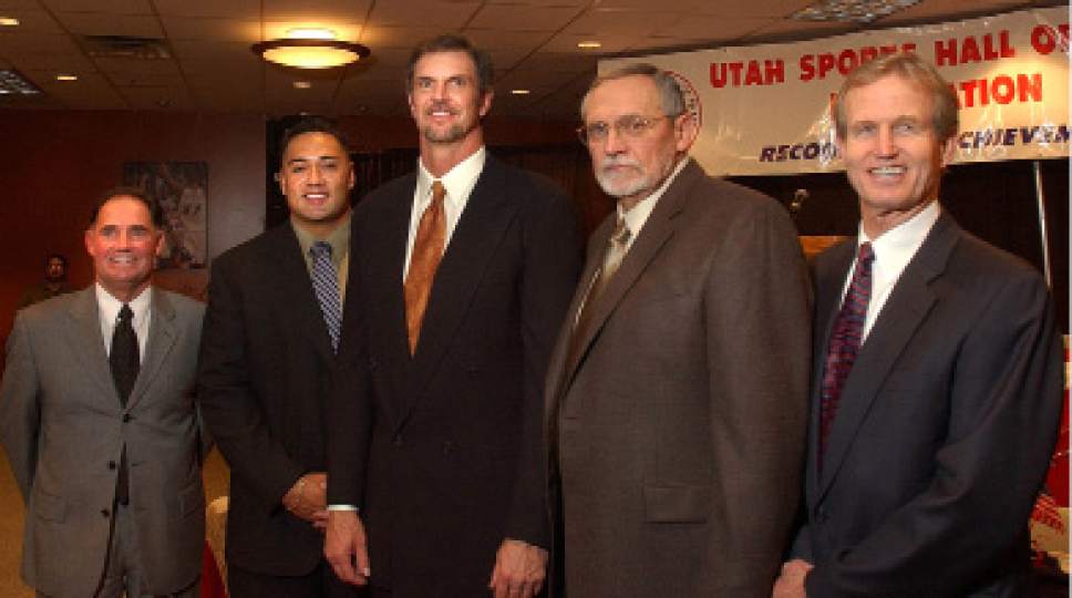 |  Tribune File Photo

The 2004 inductees into the Utah Sports Hall of Fame (from left to right) Gary Pullins, Alfred Pupunu, Danny Vranes, Ken Hunt, and Carl McGown at the ceremony on November 11, 2004.