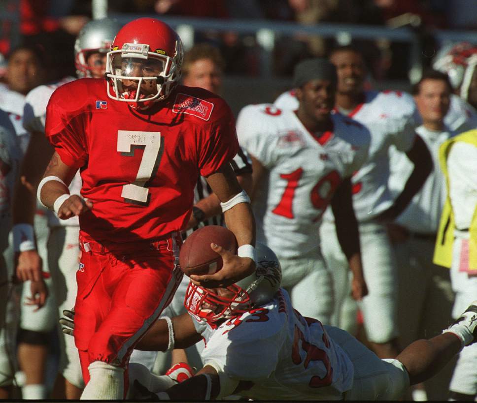 Rick Egan  |  The Salt Lake Tribune

Utes Steve Smith steps out of a tackle attempt, from Homon Wiggins of the Lobos, on his way his first of punt return touchdown against the Lobos on November 13, 1999.