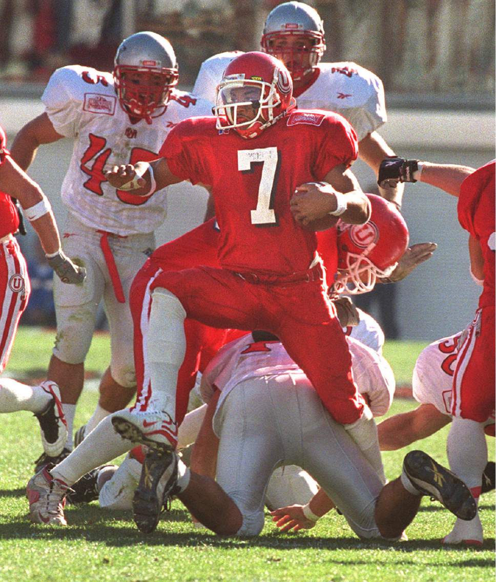 Rick Egan  |  The Salt Lake Tribune 

Utes Steve Smith breaks a tackle on his way to a his second touchdown on a punt return against the Lobos on November 13, 1999.