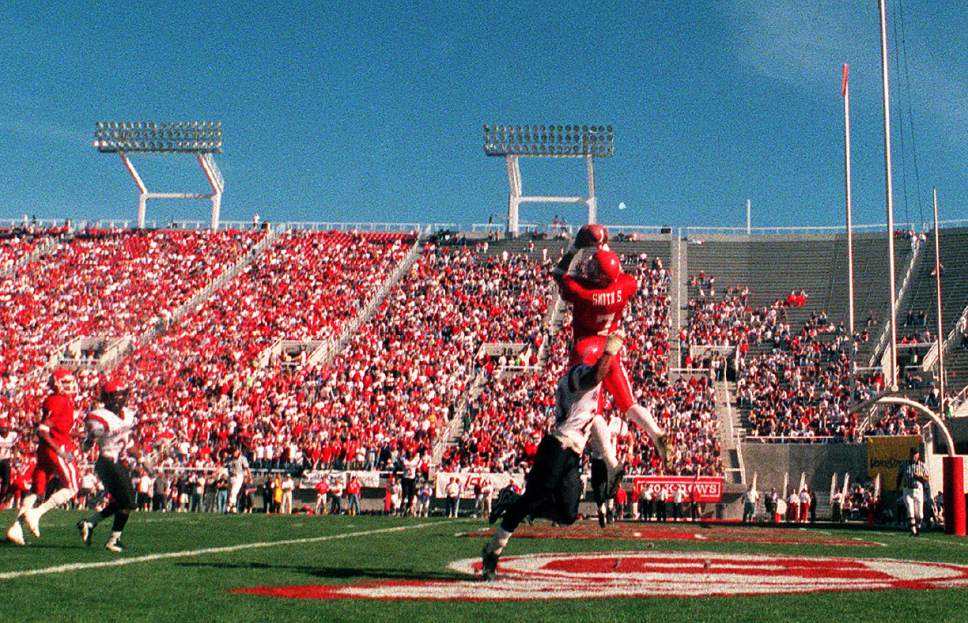 Rick Egan  |  The Salt Lake Tribune

Steve Smith leaps high into the air for a touchdown catch against San Diego State on October 23, 1999.