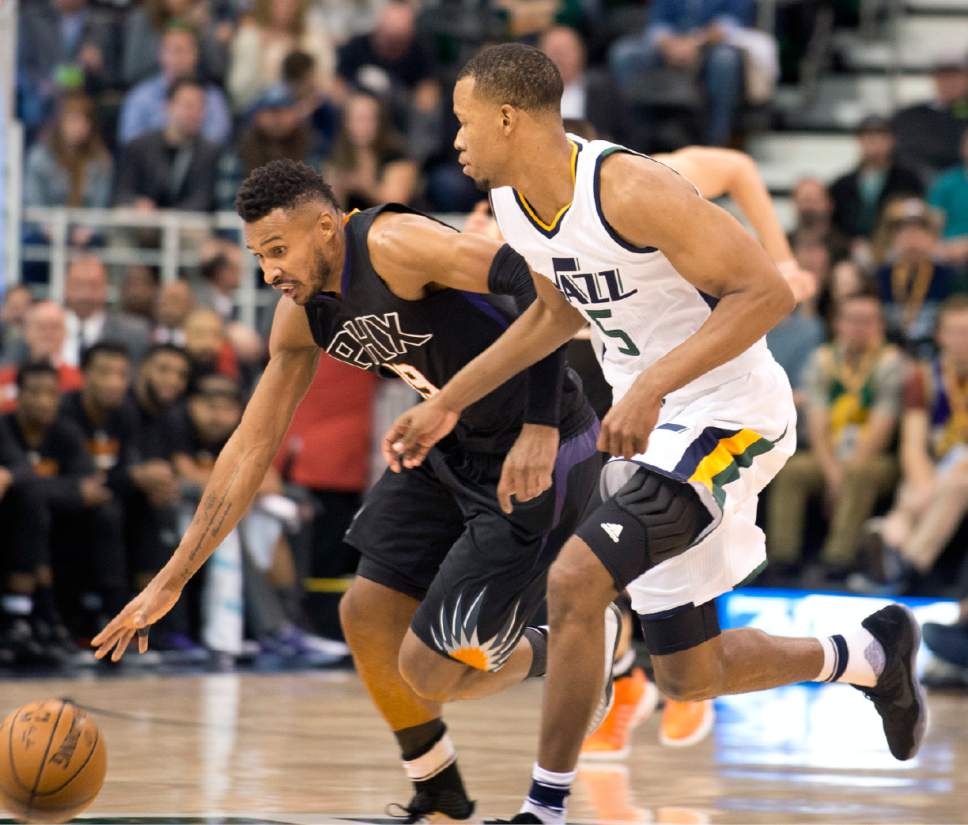 Lennie Mahler  |  The Salt Lake Tribune

Jazz guard Rodney Hood defends Phoenix Suns guard Leandro Barbosa on a fast break in the first half of a game Saturday, Dec. 31, 2016, at Vivint Smart Home Arena in Salt Lake City.