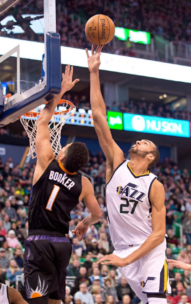 Lennie Mahler  |  The Salt Lake Tribune

Jazz center Rudy Gobert blocks a layup from Phoenix Suns guard Devin Booker in the first half of a game Saturday, Dec. 31, 2016, at Vivint Smart Home Arena in Salt Lake City.