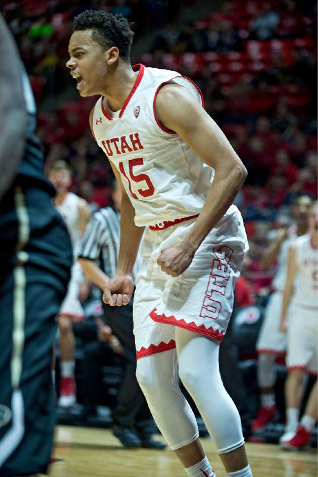 Lennie Mahler  |  The Salt Lake Tribune

Utah guard Lorenzo Bonam celebrates his dunk over Colorado's Wesley Gordon in the second half of a game against the Colorado Buffaloes on Sunday, Jan. 1, 2017, at the Huntsman Center in Salt Lake City.