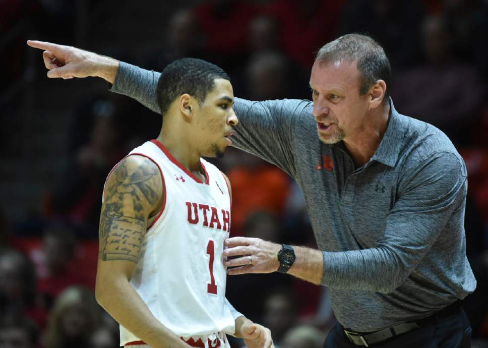 Lennie Mahler  |  The Salt Lake Tribune

Utah head coach Larry Krystkowiak talks with JoJo Zamora in the second half of a game against the Colorado Buffaloes on Sunday, Jan. 1, 2017, at the Huntsman Center in Salt Lake City.