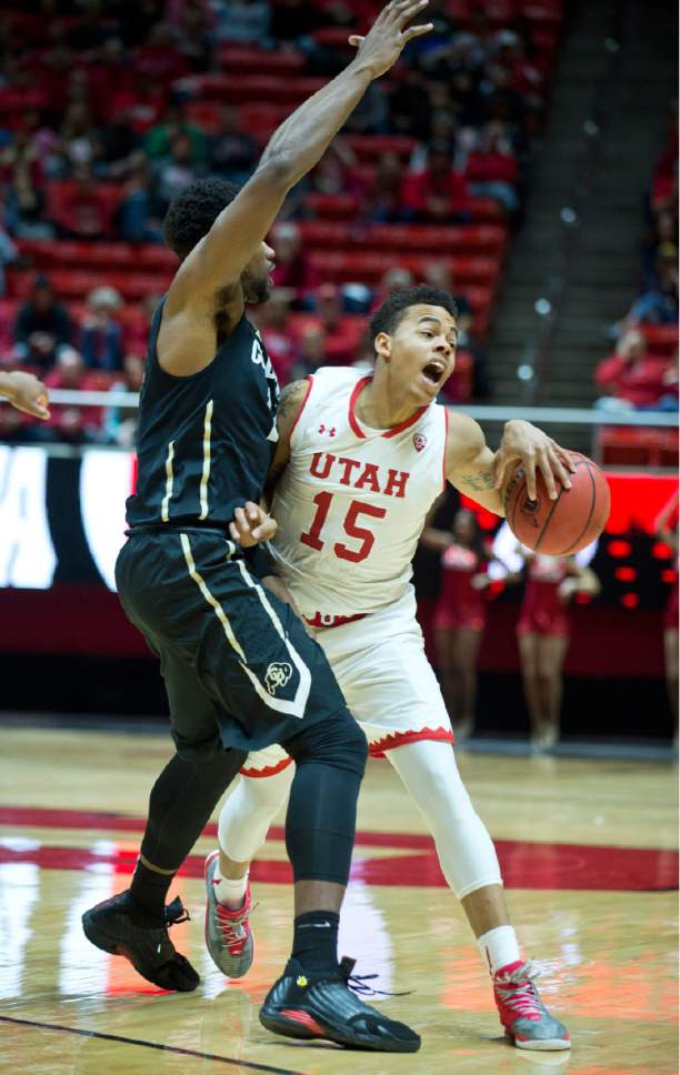 Lennie Mahler  |  The Salt Lake Tribune

Utah guard Lorenzo Bonam is bumped as he drives past Colorado's Dominique Collier in the first half of a game against the Colorado Buffaloes on Sunday, Jan. 1, 2017, at the Huntsman Center in Salt Lake City.