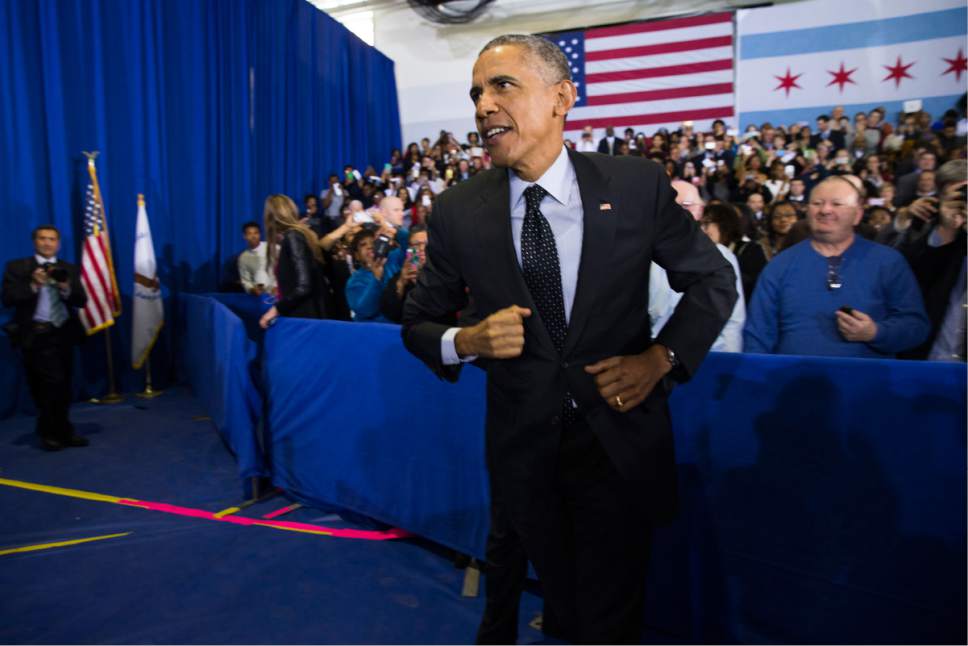 President Barack Obama arrives to speak at an event in Chicago, Thursday, Feb. 19, 2015, to designate the Pullman neighborhood a national monument, to commemorate African-Americans who served as porters, waiters and maids on the iconic Pullman sleeper cars. In the process, the president's trip to his hometown could help boost turnout for his former chief of staff, Rahm Emanuel, who is running for re-election in Tuesday's contest. Obama also announced Browns National Monument in Colorado and Honouliuli National Monument in Hawaii. (AP Photo/Evan Vucci)