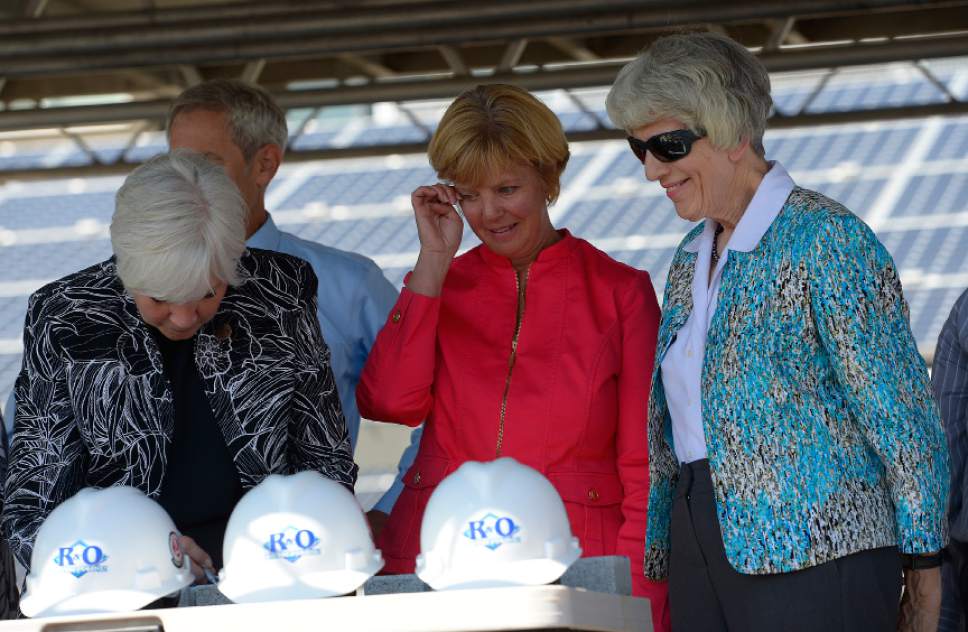 Leah Hogsten  |  The Salt Lake Tribune
l-r Donors to the Volunteers of America, Gail Miller, Kathy Bray who is CEO and President of VOA and humanitarian and homeless advocate Pamela Atkinson penned their names and inspirational messages on bricks that will be used to build the new facility. The Volunteers of America broke ground on a new 30-bed shelter at 888 South and 400 West for teens and young adults, August 22, 2015