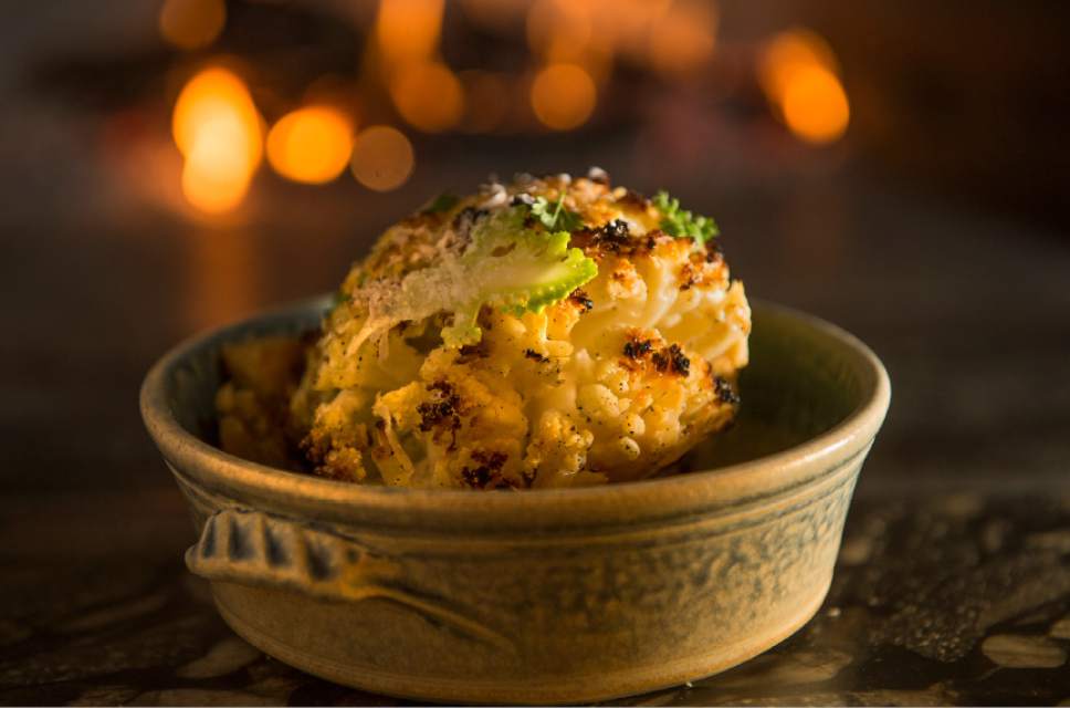 Leah Hogsten  |  The Salt Lake Tribune
Cauliflower is being called the new kale for 2017. Briar Handly, chef at HSL in Salt Lake City and Handle in Park City, is blazing the cauliflower trail among Utah chefs. His latest variation is "Hearth Roasted Cauliflower," a whole head of cauliflower that has been roasted and basted in a wood-fired oven at 700 degrees for almost three hours.
