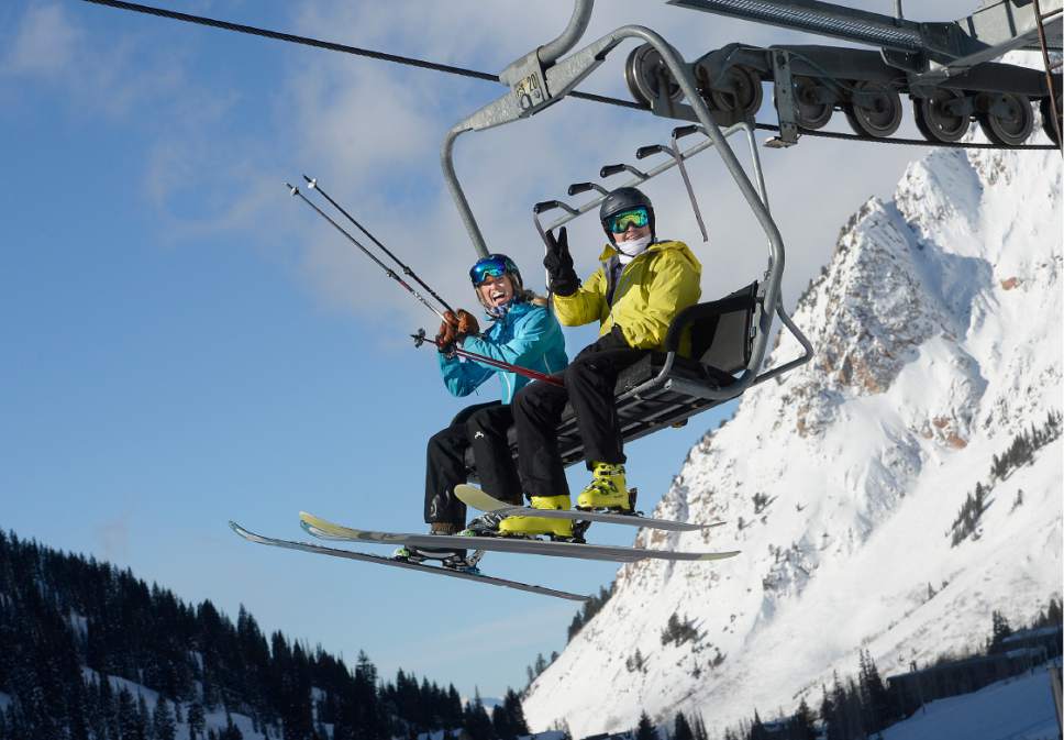 Scott Sommerdorf   |  The Salt Lake Tribune  
Happy skiers yell "Happy New Year" as they take their first chairlift ride on the Sunnyside lift at Alta, Sunday, January 1, 2017.