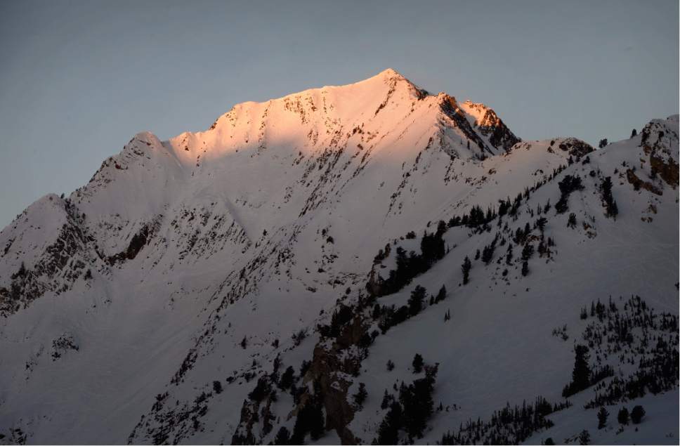 Scott Sommerdorf   |  The Salt Lake Tribune  
Sunrise lighting the peak of Mt. Superior greeted the hearty early skiers at Alta, Sunday, January 1, 2017.