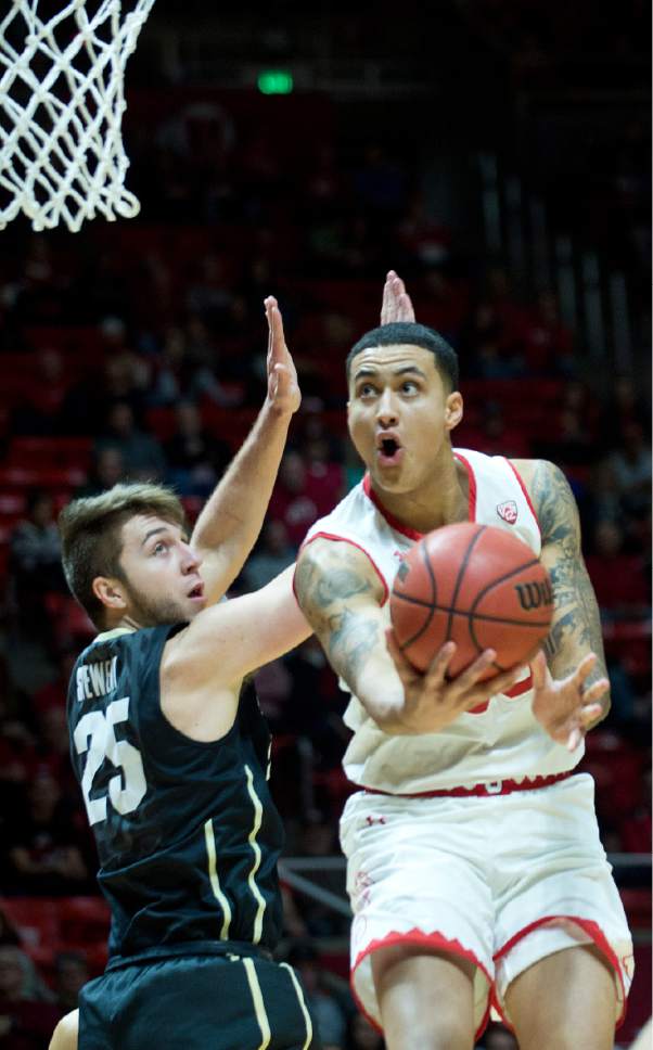 Lennie Mahler  |  The Salt Lake Tribune

Utah forward Kyle Kuzma lays the ball up as he is defended by Colorado's Lucas Siewert in the first half of a  game against the Colorado Buffaloes on Sunday, Jan. 1, 2017, at the Huntsman Center in Salt Lake City.