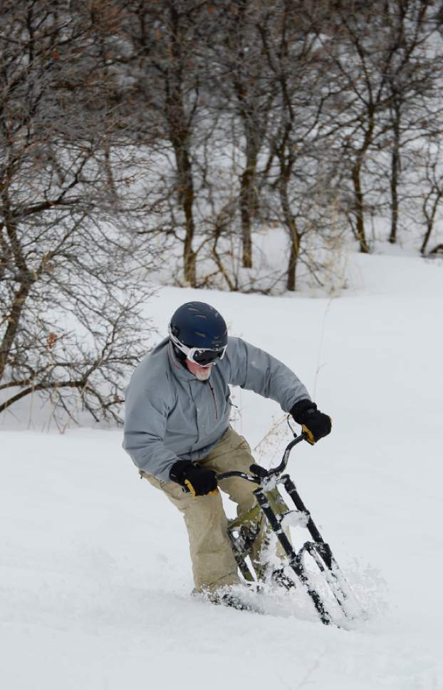 Francisco Kjolseth | The Salt Lake Tribune
Mike Kerr of Salt Lake glides down a slope from the top of Emigration Canyon with the aid of a ski bike on Wednesday, Jan. 4, 2016.