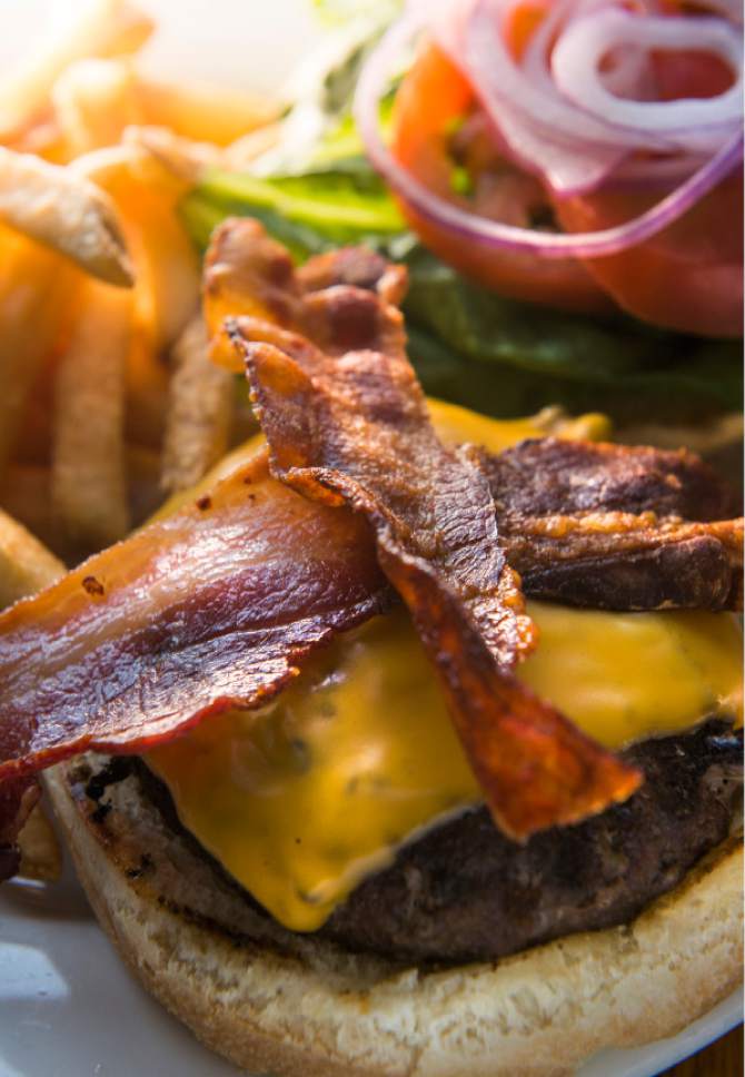 Leah Hogsten  |  The Salt Lake Tribune
The Established Burger for $15 with lettuce, tomato and onion,  at The Eating Establishment in Park City, which was recently purchased by the owners of Bar X and Beer Bar in Salt Lake City.