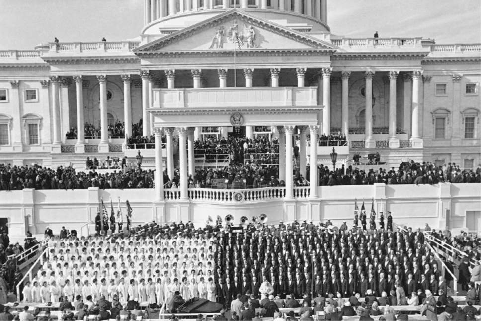 Members of the Mormon Tabernacle Choir are shown at the Capitol in Washington, Jan. 20, 1965 moments before the arrival of President Lyndon Johnson for his inaugural. (AP Photo)