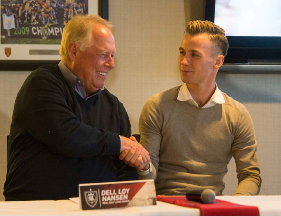 Rick Egan  |  The Salt Lake Tribune

Dell Loy Hansen shakes hands with Real Salt Lake's newest designated player, Albert Rusnak, Friday, January 6, 2017.