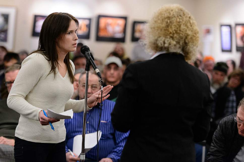 Trent Nelson  |  The Salt Lake Tribune
Salt Lake City resident Mary Thompson asks a question of  Mayor Jackie Biskupski at a meeting of the Sugar House Community Council at the Sprague Library in Salt Lake City on Wednesday, Jan. 4, 2017. The meeting hosted city officials who addressed the proposed shelter at 653 E. Simpson Ave. that Biskupski said Tuesday could conceivably be "rethought," even if the city hasn't changed its mind.