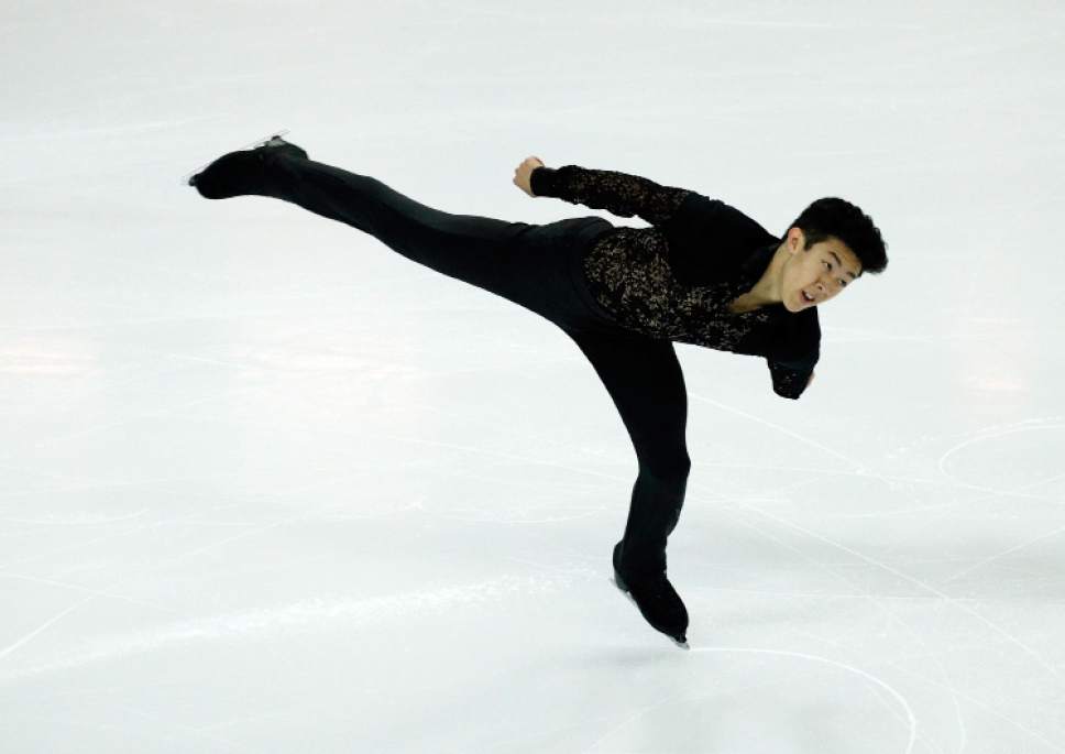 Nathan Chen of the U.S competes in the Men Short Program during ISU Grand Prix of Figure Skating Final in Marseille, southern France, Thursday, Dec. 8, 2016. (AP Photo/Christophe Ena)