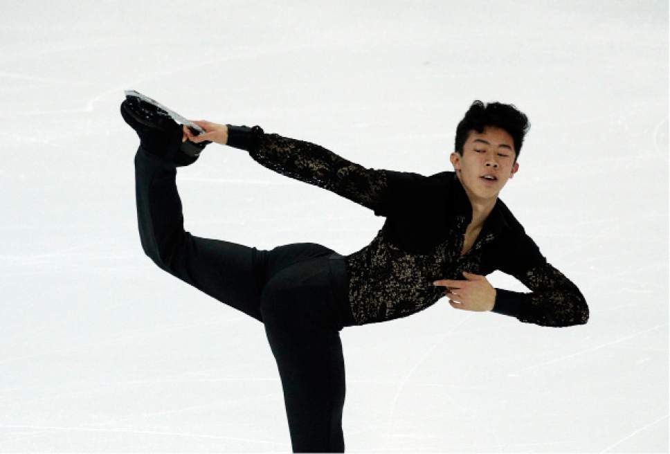 Nathan Chen of the U.S competes in the Men Short Program during ISU Grand Prix of Figure Skating Final in Marseille, southern France, Thursday, Dec. 8, 2016. (AP Photo/Christophe Ena)