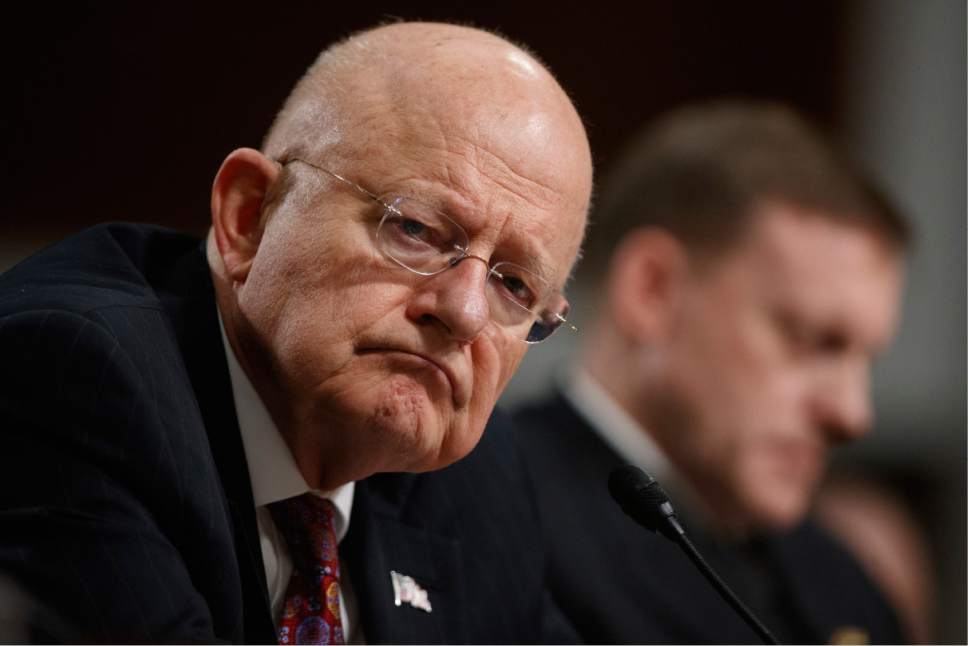 Director of National Intelligence James Clapper listens to questions while testifying on Capitol Hill in Washington, Thursday, Jan. 5, 2017, before the Senate Armed Services Committee hearing: "Foreign Cyber Threats to the United States."  (AP Photo/Evan Vucci)