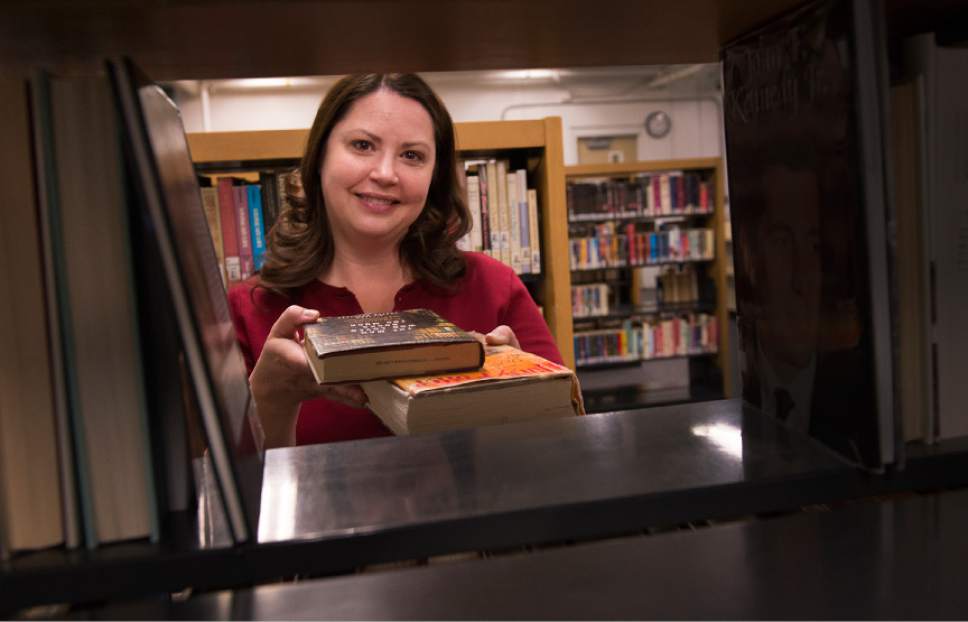 Leah Hogsten  |  The Salt Lake Tribune
Older male inmates tend to enjoy reading old Westerns. Female inmates tend to enjoy the romance section. Both groups enjoy science fiction. Utah State Prison librarian, Christie Jensen, has managed the prison's five libraries for over 11 years. "Reading expands their minds and gives them a different perspective," said Jensen.