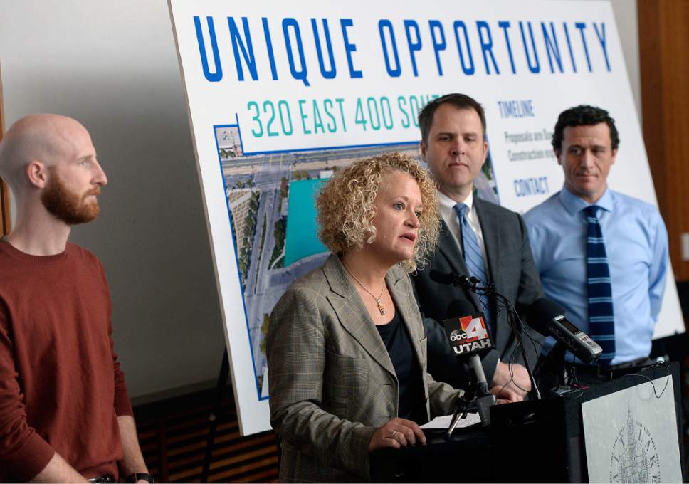 Al Hartmann  |  The Salt Lake Tribune
Salt Lake City Council member, District 4, Derek Kitchen, left, Mayor Jackie Biskupski, Mike Akerlow, Deputy Director of Community and Neighborhoods, and Justin Belliveau, COO of Redevelopment Agency announce plans  to launch a development that includes "start up" micro-unit apartments, business incubator space and affordable housing units, as well as market-rate space and ground-level retail, on a 2.3-acre property at the site of the old Barnes Bank building at 320 East 400 South.
