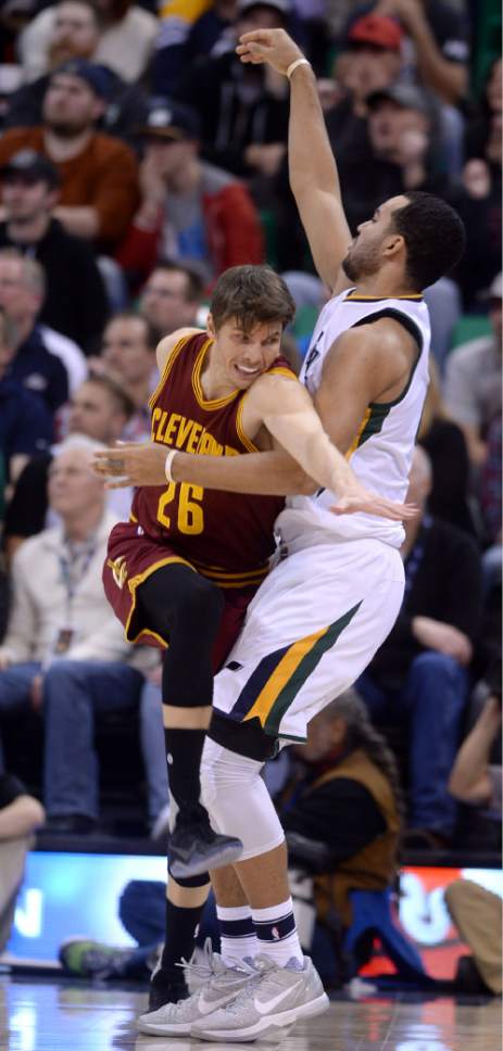 Steve Griffin / The Salt Lake Tribune

Cleveland Cavaliers guard Kyle Korver (26) crashes into Utah Jazz forward Trey Lyles (41) fouling him on a three-pointer during the Utah Jazz versus Cleveland Cavaliers NBA basketball game at Vivint Smart Home Arena in Salt Lake City Tuesday January 10, 2017.