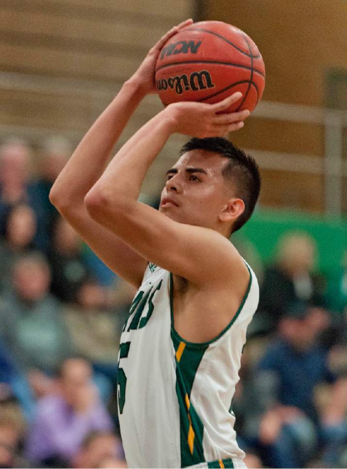 Michael Mangum  |  Special to the Tribune

Kearns Cougars senior Miguel Hernandez (15) takes a free throw during their prep basketball game at Kearns High School in Salt Lake City on Tuesday, January 10, 2017. Kearns won 70-59.
