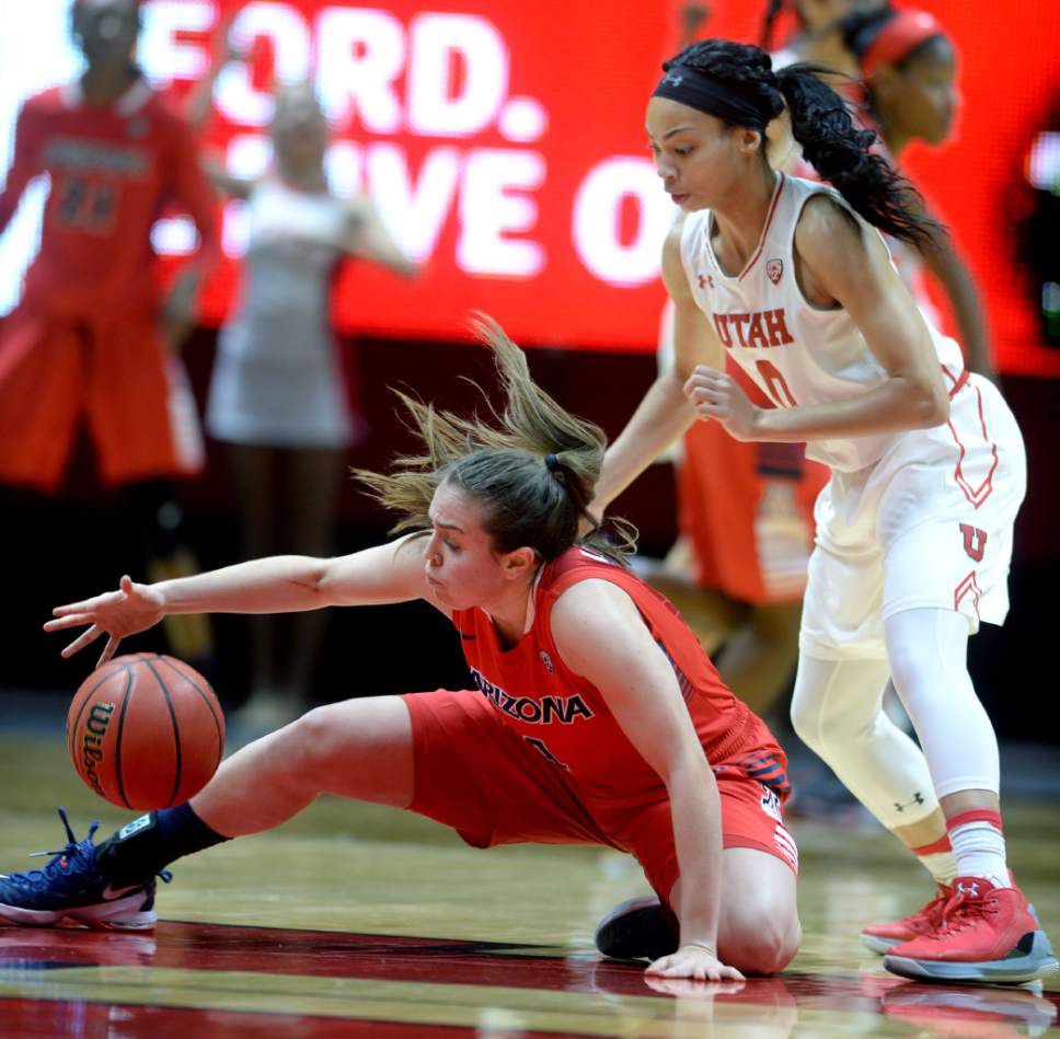 Steve Griffin / The Salt Lake Tribune

Arizona Wildcats guard Lucia Alonso (4) reaches for the ball after Utah Utes guard Kiana Moore (0)knocked the ball away during Pac-12 game against Arizona at the Huntsman Center in Salt Lake City Sunday January 8, 2017.