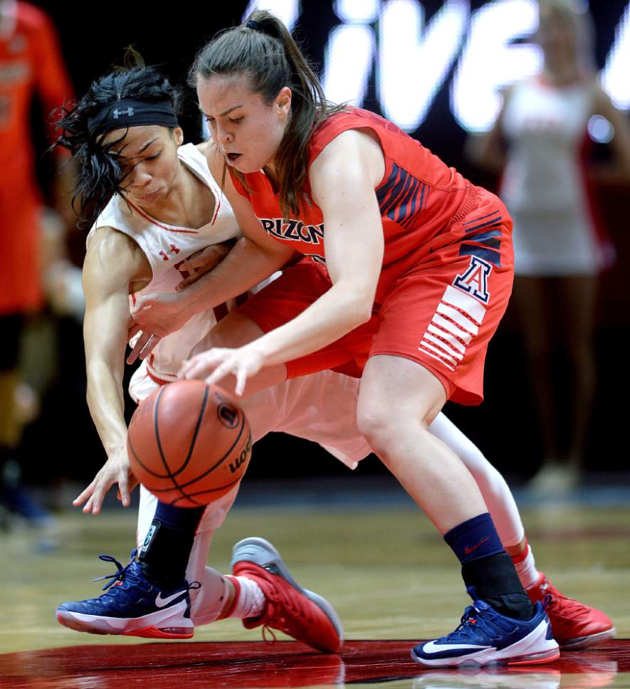 Steve Griffin / The Salt Lake Tribune

Utah Utes guard Kiana Moore (0) tries to steal the ball from Arizona Wildcats guard Lucia Alonso (4) during Pac-12 game against Arizona at the Huntsman Center in Salt Lake City Sunday January 8, 2017.