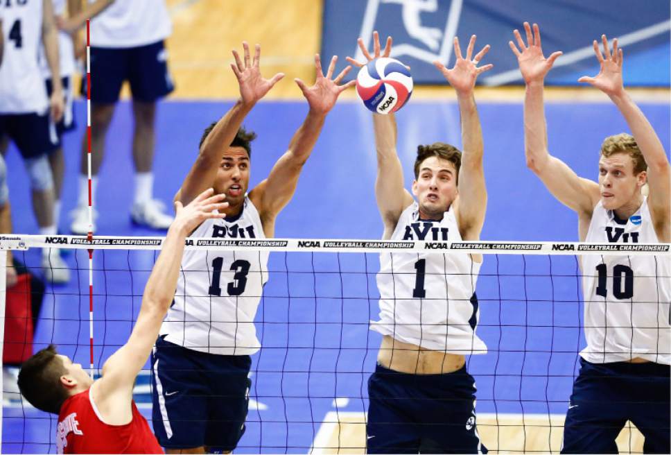 Patch, Jarman, Langlois_W2_4753

BYU's Ben Patch, Price Jarman and Jake Langlois block a ball. The BYU men's volleyball was defeated by Ohio State 0-3 in the Championship Match of the NCAA Men's Volleyball Championships. The Championships were hosted at Rec Hall, on the Penn State campus in University Park, Pennsylvania.

April 7, 2016

Photo by Jaren Wilkey/BYU

© BYU PHOTO 2016
All Rights Reserved
photo@byu.edu  (801)422-7322