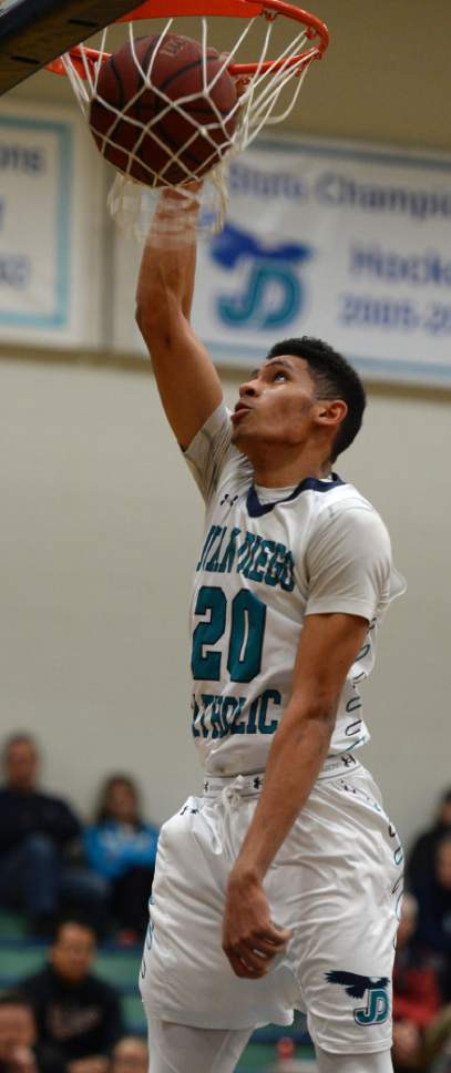 Steve Griffin / The Salt Lake Tribune

 Juan Diego's Steven Price throws down a dunk against Bear River at Juan Diego Catholic High School in Draper Wednesday January 11, 2017. Price was fouled on the play before the shot.