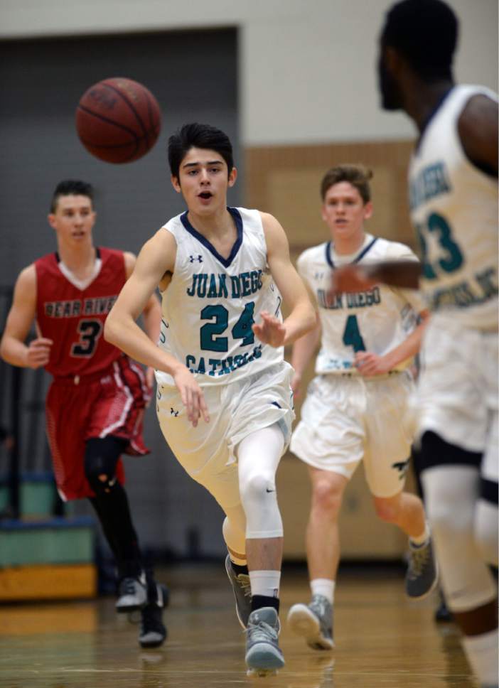 Steve Griffin / The Salt Lake Tribune

 Juan Diego's Ignacio Arroyo fires a pass up court during game against  Bear River at Juan Diego Catholic High School in Draper Wednesday January 11, 2017.