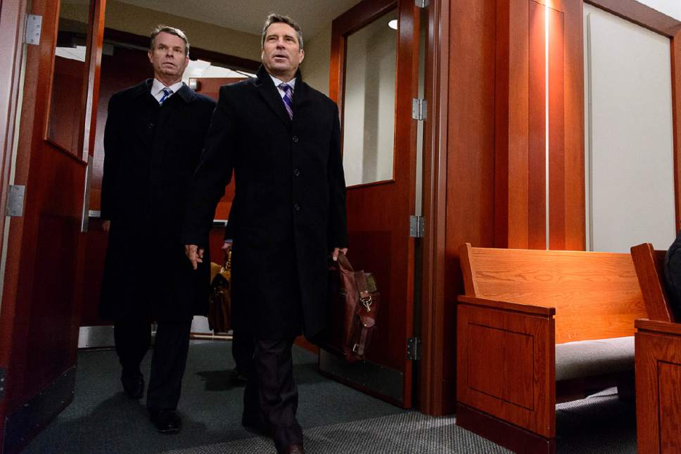 Trent Nelson  |  The Salt Lake Tribune
Former Utah Attorney General John Swallow, left, charged with bribery and public corruption, arrives at a motion hearing in Salt Lake City, Friday December 9, 2016 with his attorney Scott C. Williams.