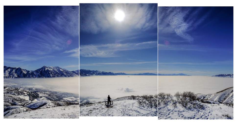 Francisco Kjolseth | The Salt Lake Tribune
Jason Dunn of Draper seeks higher, cleaner air as he rides his bike to a peak overlooking an obscured Utah County in February 2016.