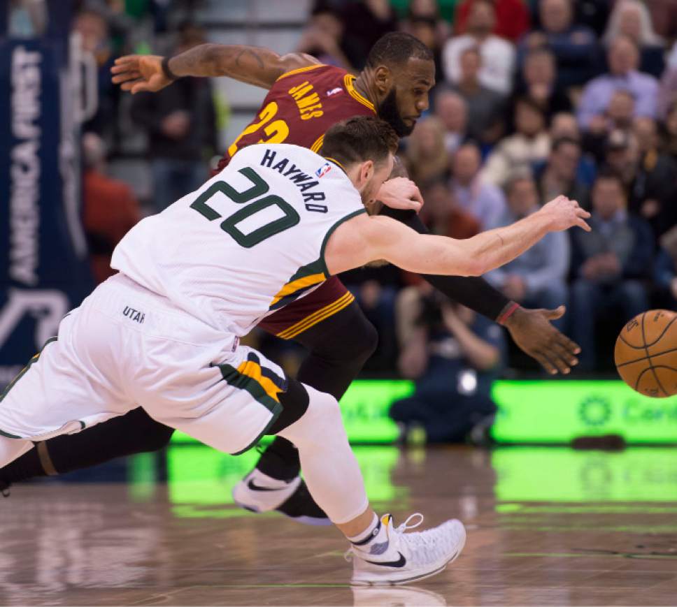 Steve Griffin / The Salt Lake Tribune

Utah Jazz forward Gordon Hayward (20) and Cleveland Cavaliers forward LeBron James (23) fight for the ball during the Utah Jazz versus Cleveland Cavaliers NBA basketball game at Vivint Smart Home Arena in Salt Lake City Tuesday January 10, 2017.