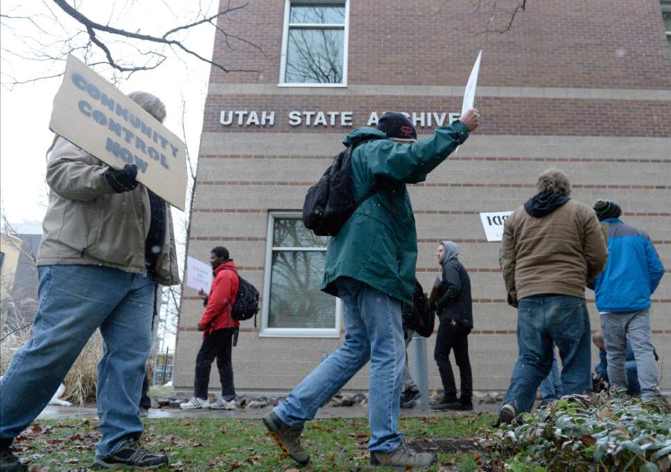 Al Hartmann  |  The Salt Lake Tribune 
About a dozen members of Utahns Against Police Brutality hold a protest in front of the Utah State Archives Building in Salt Lake City Thursday Jan. 12 in support of the ACLU and Dissenters For Justice, who are arguing a GRAMA request before the State Records Committee for release of the police shooting video of Abdi Mohamed.